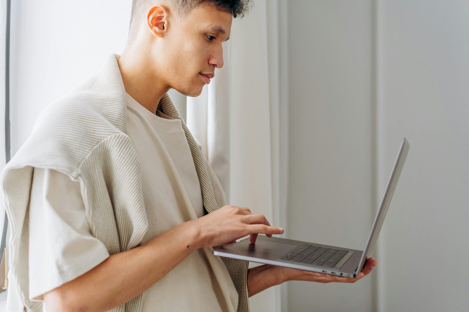 A person looking frustrated next to a glowing smart clock interface