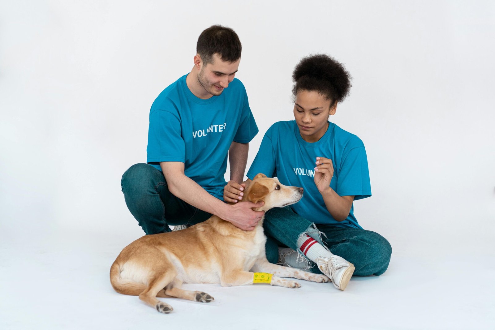 Hurricane survivor holding her rescued dog near a smart clock