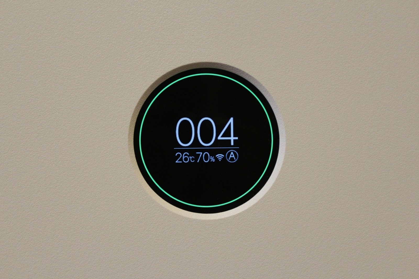 customizable smart clock on bedside table
