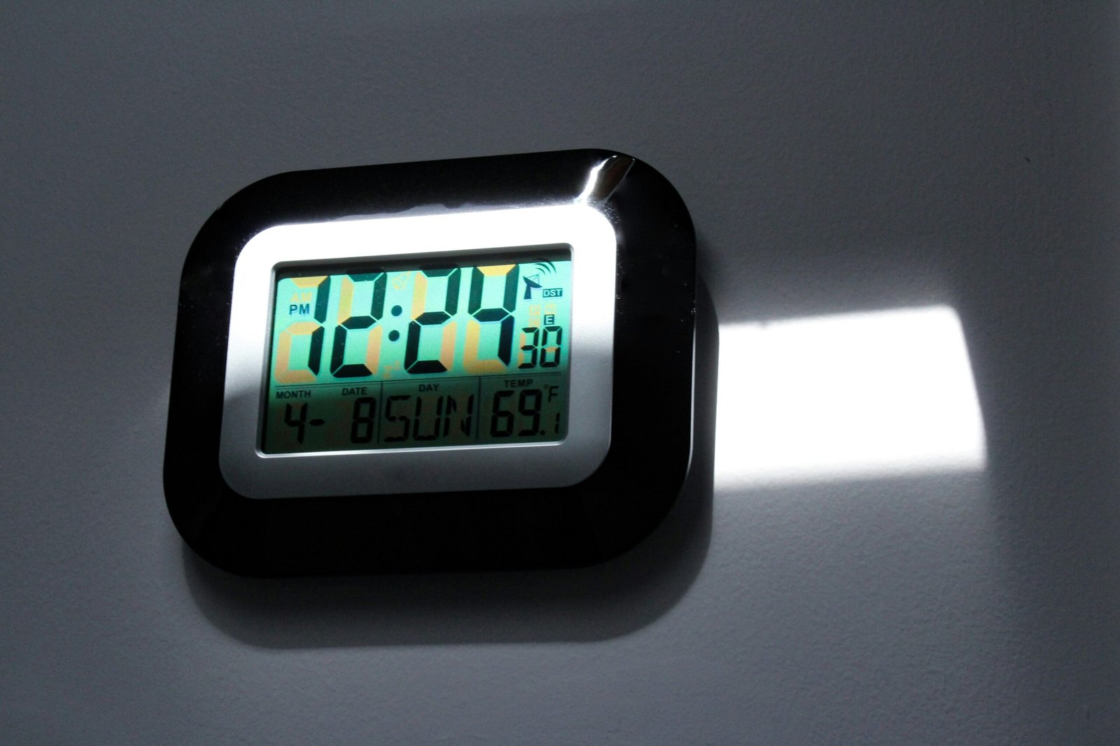 smart clock on bedside table