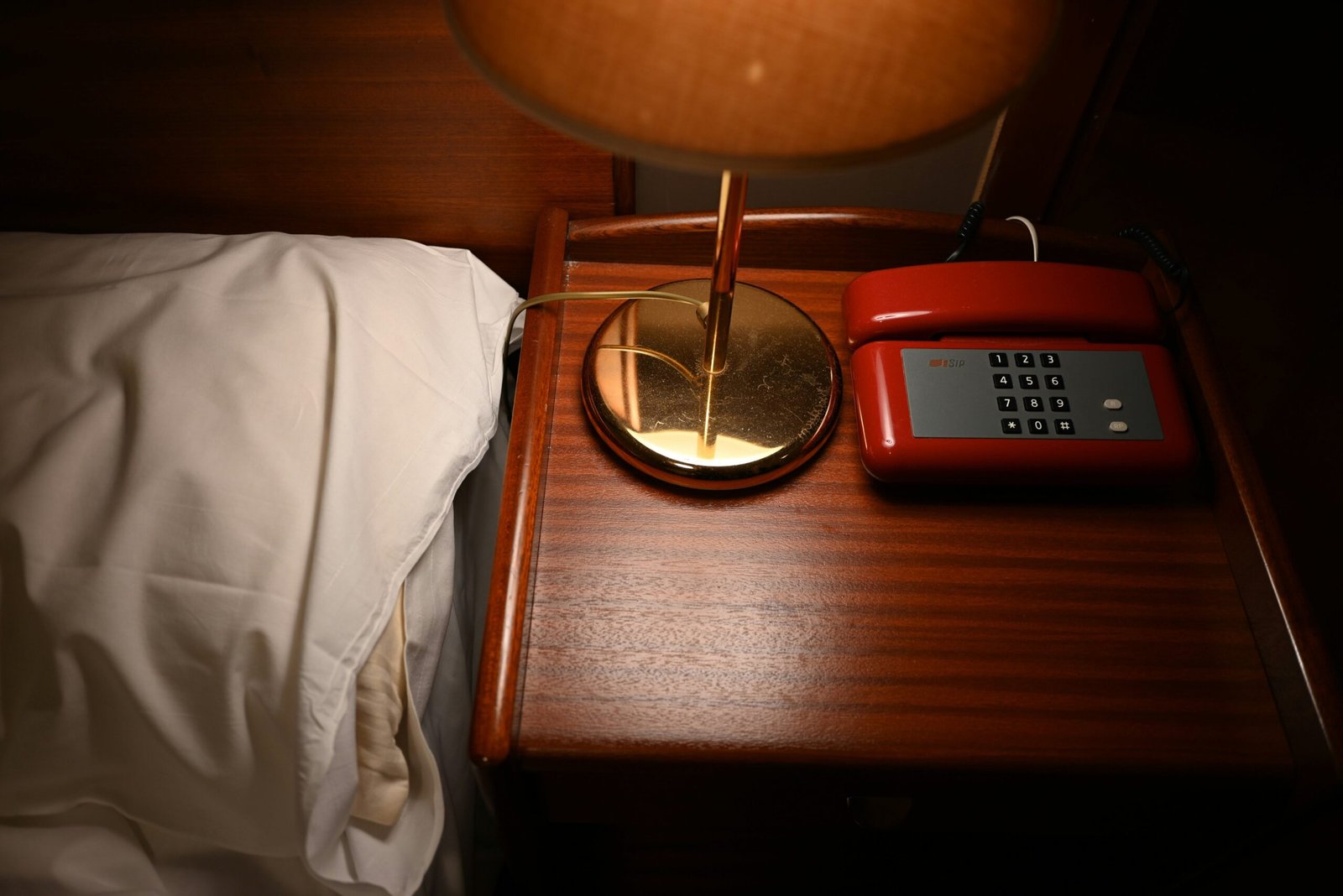 Comparison between a basic alarm clock and a modern smart clock with glowing display